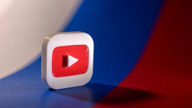 FILE PHOTO: Illustration shows Youtube logo and Russian flag