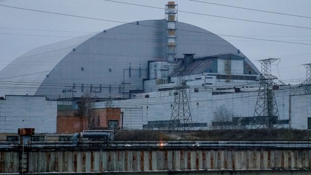 FILE PHOTO: A general view shows the New Safe Confinement structure over the old sarcophagus covering the damaged fourth reactor at the Chernobyl Nuclear Power Plant, in Chernobyl