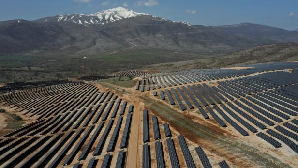 Solar panels used to produce renewable energy are pictured during the launch event of a photovoltaic park near Kozani
