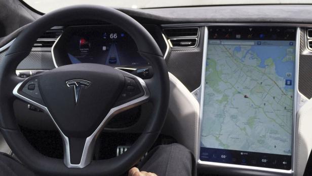 FILE PHOTO: The interior of a Tesla Model S is shown in autopilot mode in San Francisco