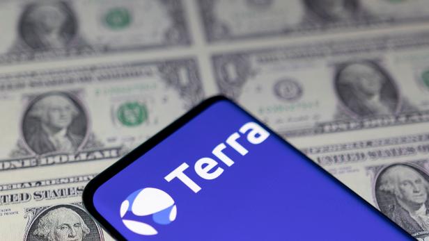 Illustration shows Terra logo and U.S. dollars