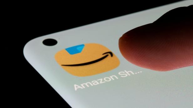 Amazon app is seen on a smartphone in this illustration