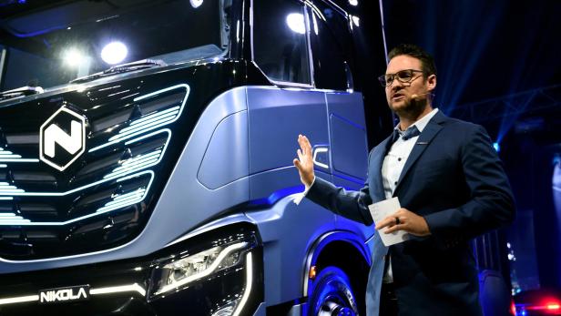 FILE PHOTO: CEO and founder of U.S. Nikola Trevor Milton speaks during presentation of its new full-electric and hydrogen fuel-cell battery trucks in partnership with CNH Industrial, at an event in Turin