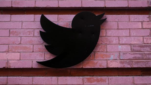 The Twitter logo is seen outside the offices in New York