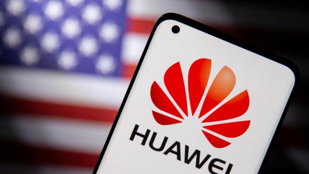 FILE PHOTO: Smartphone with a Huawei logo is seen in front of U.S. flag in this illustration