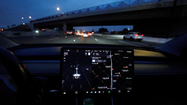 FILE PHOTO: Many U.S. drivers treat partially automated cars as self-driving -study