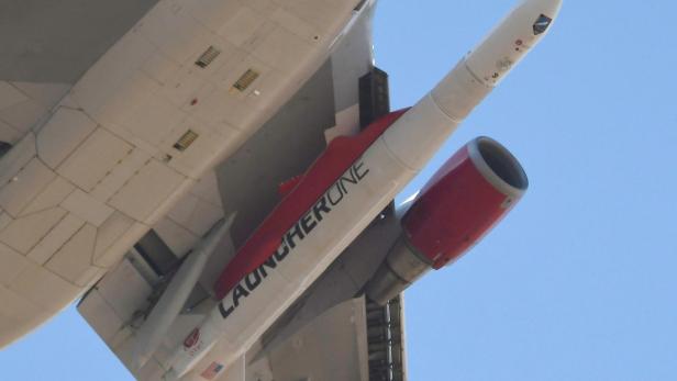 FILE PHOTO: A modified Boeing 747 takes flight carrying Virgin Orbit's LauncherOne rocket, in Mojave