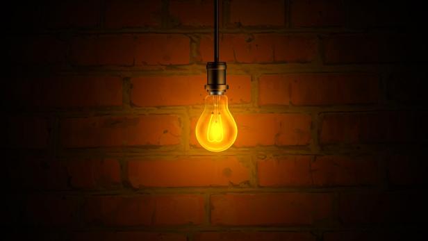 Light Bulb and Brick Wall