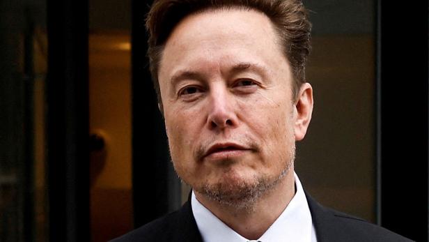 FILE PHOTO: Tesla CEO Musk departs the companys local office in Washington