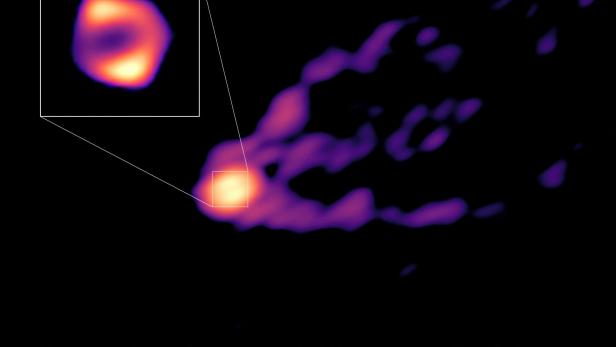 Jet and shadow of the black hole at the center of the M87 galaxy