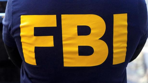 FILE PHOTO: An FBI logo is pictured on an agent's shirt in the Manhattan borough of New York City