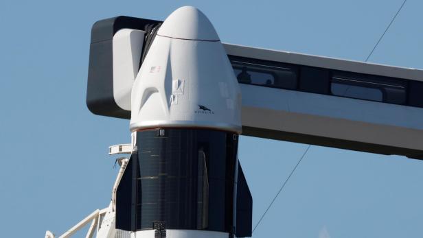 A SpaceX Falcon 9 with the Crew Dragon capsule stands on Pad-39A in preparation for the Inspiration 4 civilian crew mission at the Kennedy Space Center