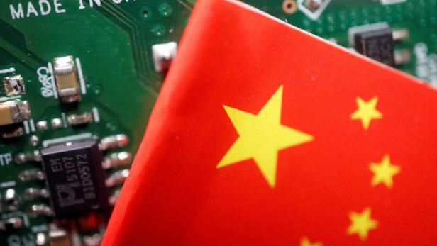 FILE PHOTO: Illustration picture of Chinese flag with semiconductor chips