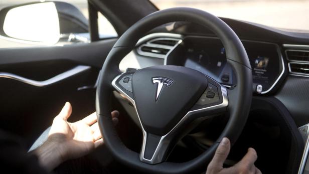 FILE PHOTO: New Autopilot features are demonstrated in a Tesla Model S during a Tesla event in Palo Alto