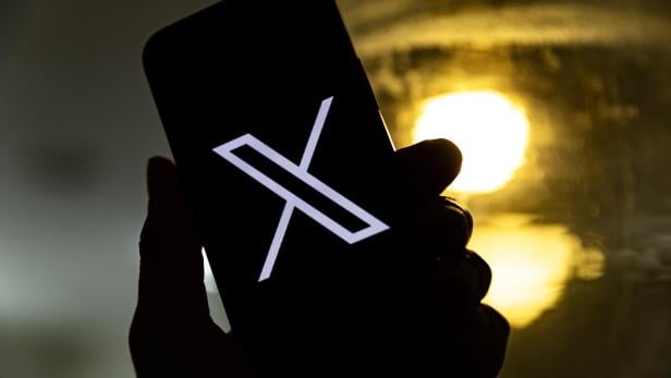 Handy mit X-Logo