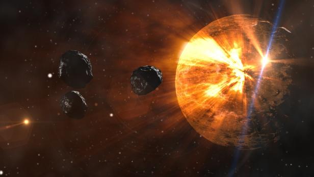 Symbolbild: Asteroiden vor der Sonne
