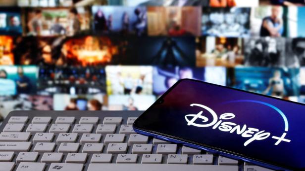 FILE PHOTO: Smartphone with displayed "Disney" logo is seen on the keyboard in this illustration