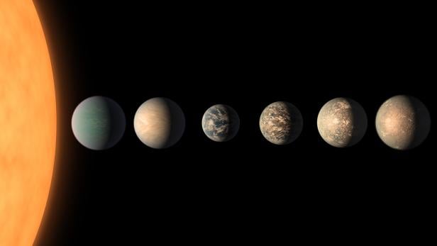 Unter den 7 Planeten des Systems TRAPPIST-1 könnte auch ein Bewohnbarer sein (künstlerische Darstellung)