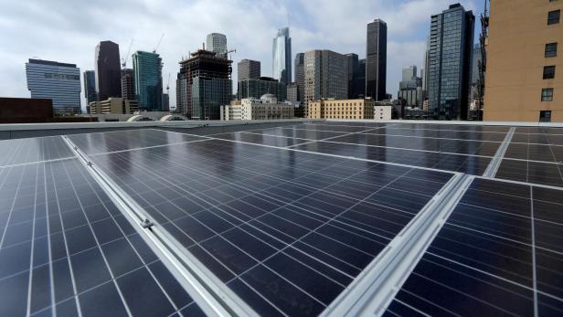 FILE PHOTO: Solar electric panels on residential building in downtown Los Angeles