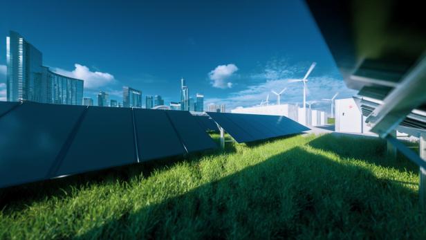 Modern black frameless solar panel farm, battery energy storage and wind turbines on fresh green grass under blue sky - concept of green sustainable energy  system. 3d rendering.