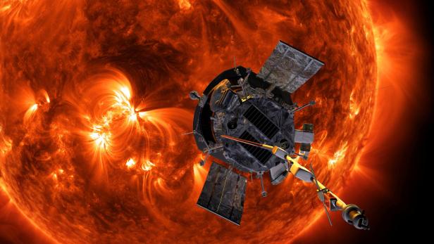 Artist's concept shows the Parker Solar Probe spacecraft flying into the Sun's outer atmosphere