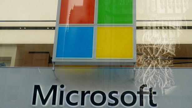 FILE PHOTO: A Microsoft logo is pictured on a store in New York