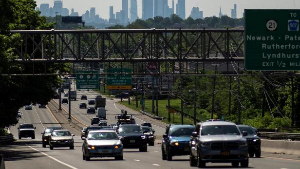 FILE PHOTO: Cars drive along a highway in New Jersey