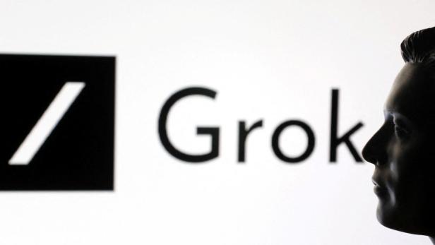 Illustration shows 3D-printed miniature model of Elon Musk and Grok logo Illustration shows 3D-printed miniature model of Elon Musk and Grok logo