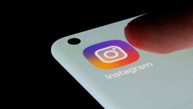 FILE PHOTO: Instagram app is seen on a smartphone in this illustration FILE PHOTO: Instagram app is seen on a smartphone in this illustration