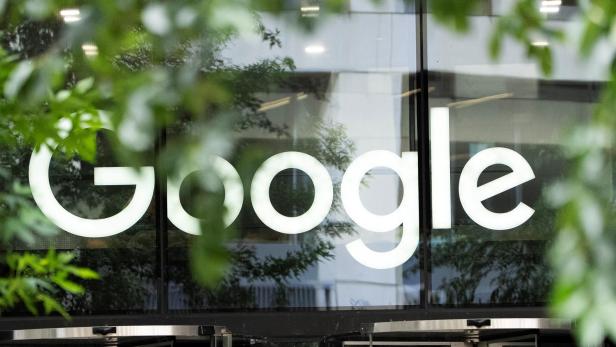 The Google logo is seen outside the company's office in London