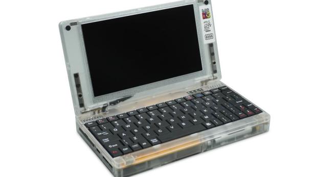 Mini-Laptop mit transparent-weißem Gehäuse und schwarzer Tastatur