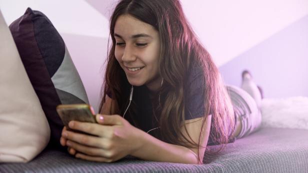 Teenage girl with mobile phone