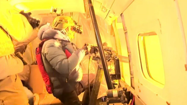 Der Minigun-Schütze im Flugzeug