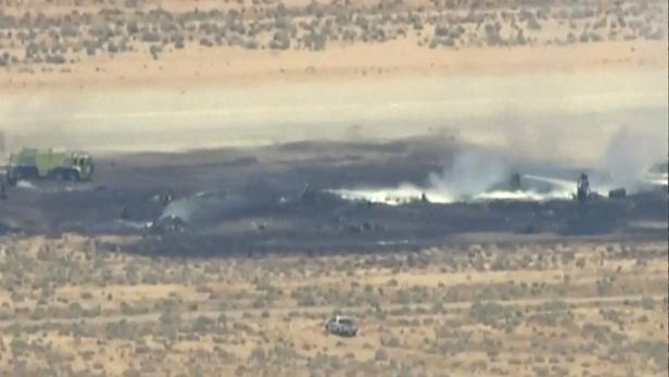 Smoke rises from Edwards Air Force Base after the crash of a U.S. Air Force B-52 bomber aircraft