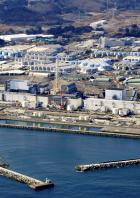 An aerial view shows the storage tanks for treated water at the tsunami-crippled Fukushima Daiichi nuclear power plant in Okuma town, Fukushima prefecture