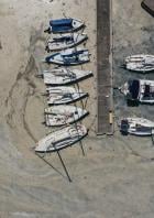 Aerial view of boats docked to a marina covered by sea snot in Istanbul