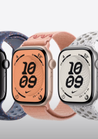 Fünf Apple Watches der Serie 11 mit verschiedenen Armbändern und Zifferblättern nebeneinander.