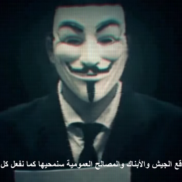 Eine Person mit einer Guy-Fawkes-Maske, ein Symbol der Anonymous-Bewegung.