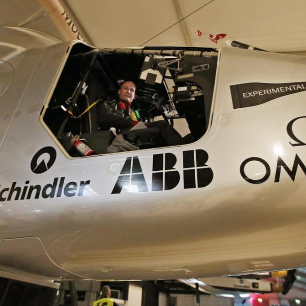 epa04644046 One of the two pilots of Solar Impulse 2 Bertrand Piccard prepares for the test flight in Abu Dhabi, UAE, 02 March 2015. After Solar Impulse 2 successfully accomplished the first test flight since the reassembly with the test pilot Markus Scherdel at the controls, the Solar Impulse 2 made the third test on 02 March 2015 with pilot Bertrand Piccard,. Solar Impulse 2, the only solar single-seater airplane able to fly day and night without a drop of fuel, will attempt the First Round-The-World Solar Flight in 07 March 2015. The aircraft departing from Abu Dhabi. Swiss founders and pilots, Bertrand Piccard and Andre Borschberg, will take turns flying Solar Impulse 2 over the Arabian Sea, to India, Myanmar, China, then across the Pacific Ocean, to the United States, and over the Atlantic Ocean to Southern Europe or Northern Africa before finishing the journey by returning to the initial departure point. EPA/ALI HAIDER