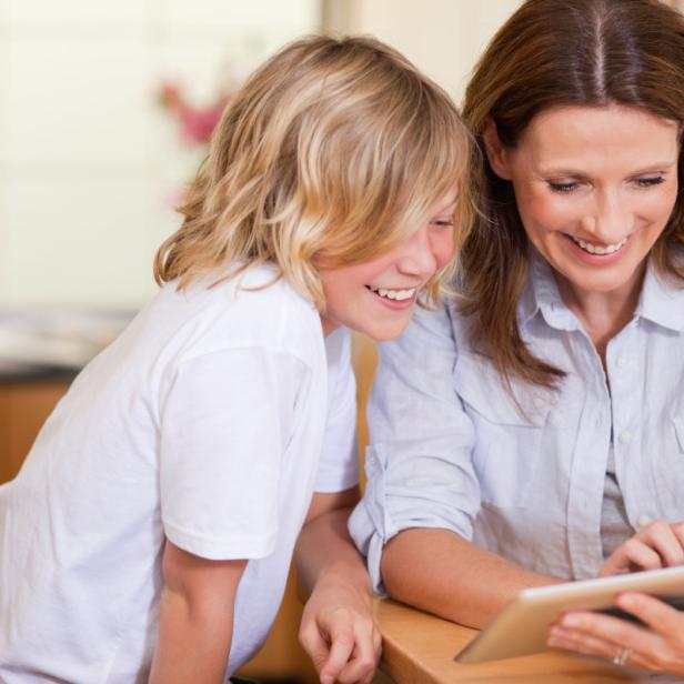 Mother and son using tablet