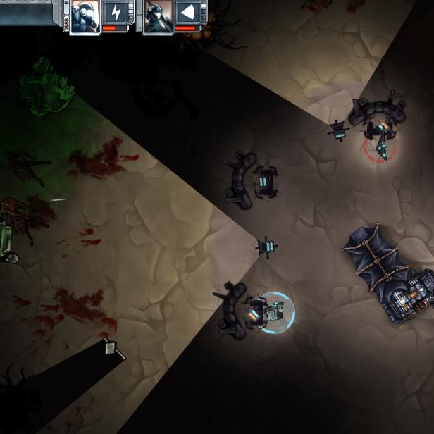 Ein Raum mit einer Spielfigur, Gegnern und Blutspuren in einem dunklen, felsigen Gebiet.