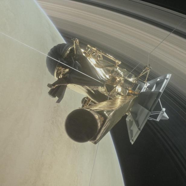 Illustration der NASA-Raumsonde Cassini über dem Saturn