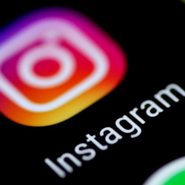 FILE PHOTO: The Instagram application is seen on a phone screen August 3, 2017. REUTERS/Thomas White/File Photo