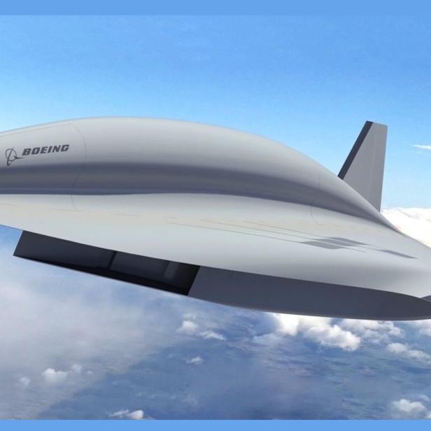 Ein Konzeptflugzeug von Boeing fliegt über den Wolken.