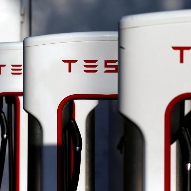 FILE PHOTO - A Tesla Supercharger station is shown in Cabazon, California