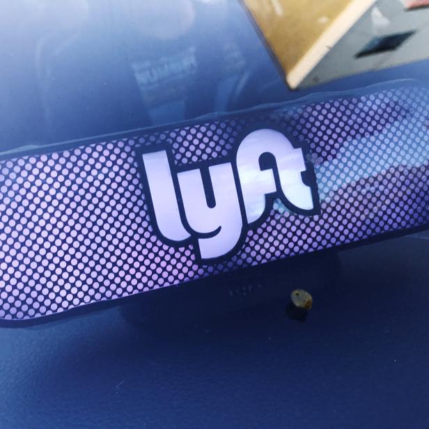 FILE PHOTO:    An illuminated sign appears in a Lyft ride-hailing car in Los Angeles