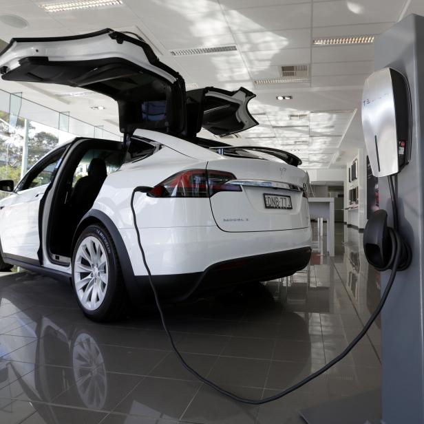 A Tesla wall connector demonstrates the charging at home of a Model X vehicle at a Tesla electric car dealership in Sydney