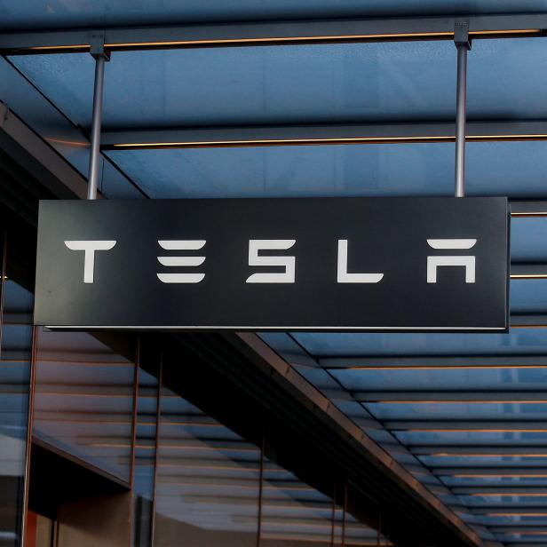 A sign is seen outside Tesla Motors' new showroom in Manhattan's Meatpacking District in New York City