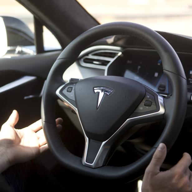 New Autopilot features are demonstrated in a Tesla Model S during a Tesla event in Palo Alto