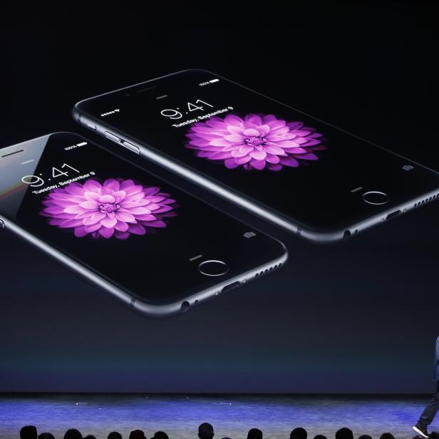 Apple CEO Tim Cook speaks during an Apple event announcing the iPhone 6 and the iPhone 6 Plus at the Flint Center in Cupertino